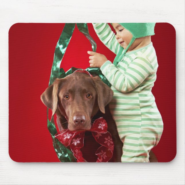 Little boy decorating a dog mouse pad (Front)