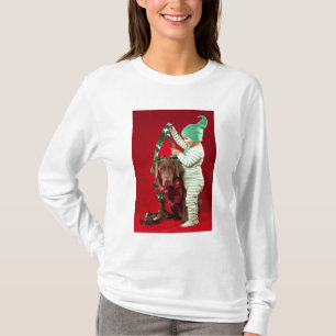 Little boy decorating a dog T-Shirt