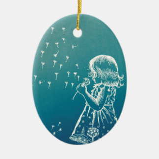 Little girl blowing on a dandelion ceramic ornament