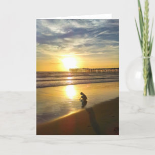 Little Girl Playing on the Beach at Sunset Card