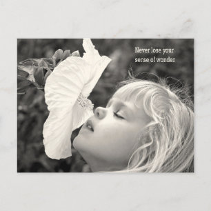 little girl sniffing hibiscus holiday postcard