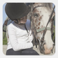 Little girl with her horse
