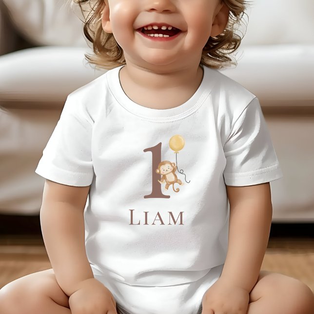 Little Monkey Birthday Number Baby T-Shirt (Toddler wearing a white T-Shirt with the number 1 and a monkey holding a balloon.)
