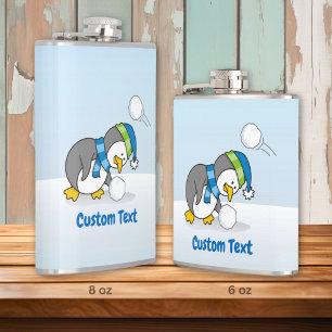 Little penguin getting a snow ball flask