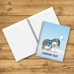 Little penguin getting a snow ball notebook