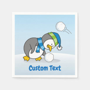 Little penguin getting a snow ball paper napkins