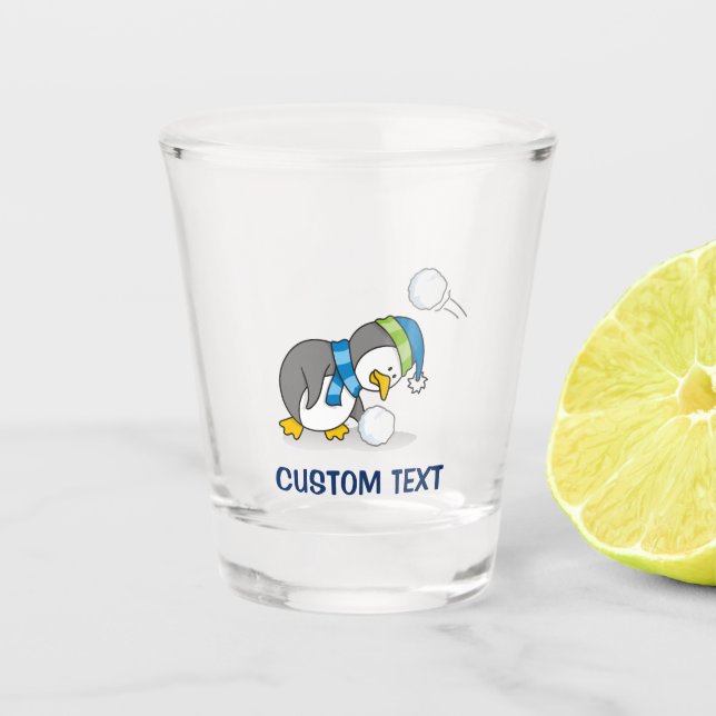 Little penguin getting a snow ball shot glass (Front)