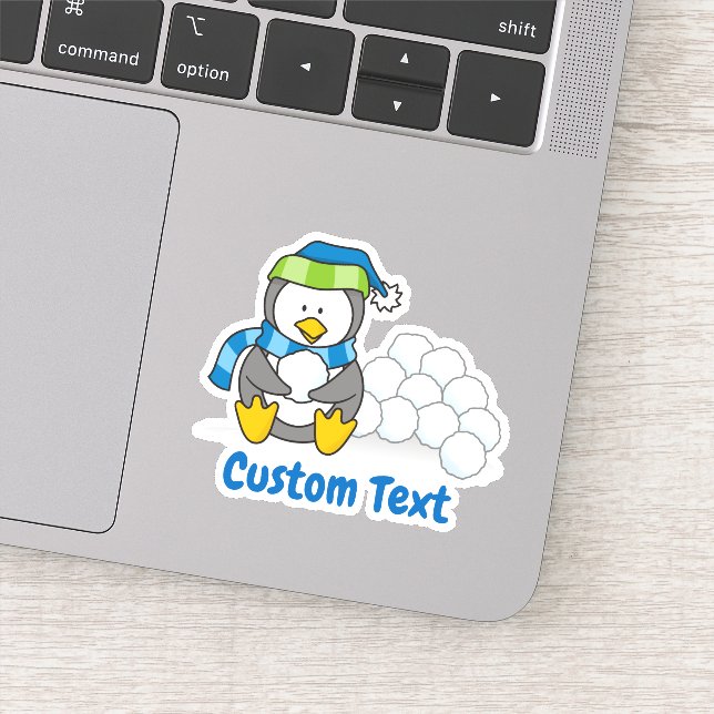 Little penguin sitting with snowballs (Detail)