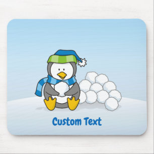 Little penguin sitting with snowballs mouse pad