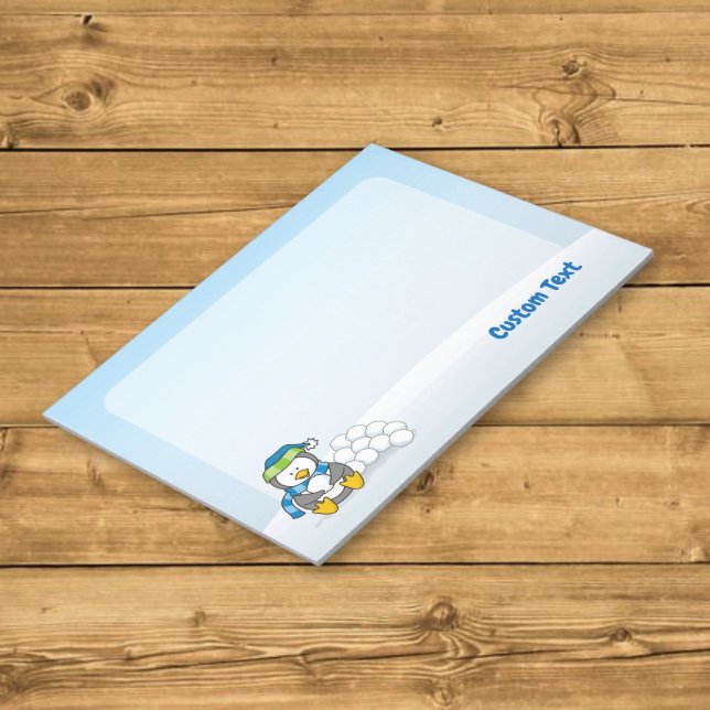 Little penguin sitting with snowballs notepad (Creator Uploaded)