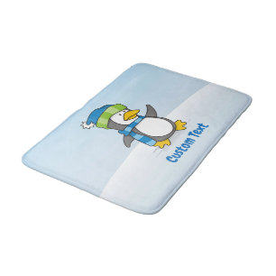 Little penguin walking on snow bath mat