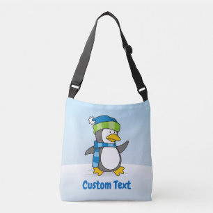 Little penguin walking on snow crossbody bag