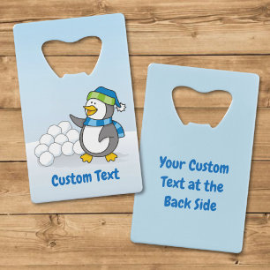 Little penguin with snow balls waving credit card
