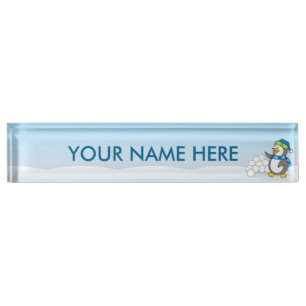 Little penguin with snow balls waving nameplate