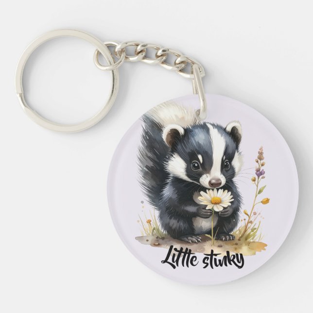 Little skunk sniffing at daisies  key ring (Front)