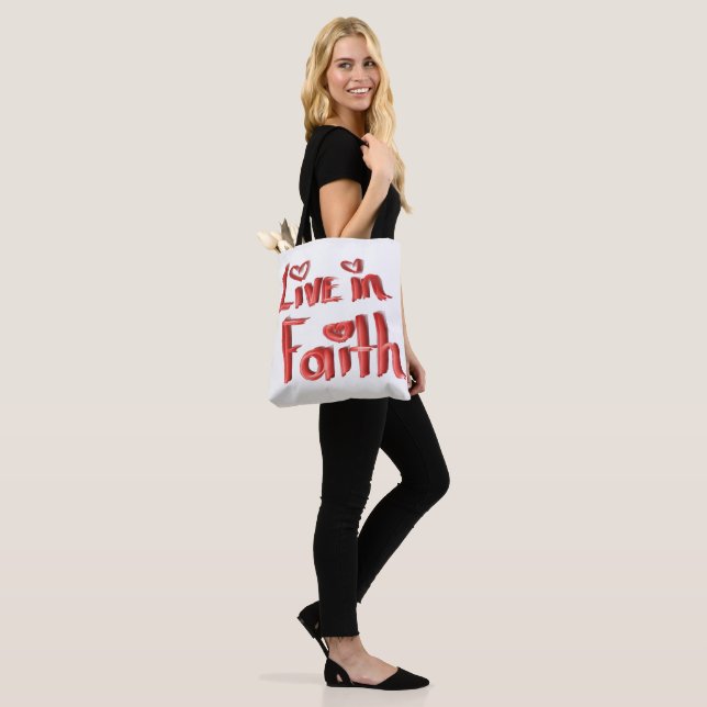 LIVE IN FAITH TOTE BAG. (On Model)