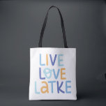 Live Love Latke Hanukkah Design Tote Bag<br><div class="desc">Celebrate the joy of Hanukkah with this colourful "Live Love Latke" design. Featuring bright colours and playful typography,  this graphic is perfect for a variety of products,  from home decor to gifts. Add a touch of holiday spirit and deliciousness to your space with this fun and festive design.</div>