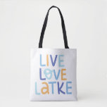 Live Love Latke Hanukkah Design Tote Bag<br><div class="desc">Celebrate the joy of Hanukkah with this colourful "Live Love Latke" design. Featuring bright colours and playful typography,  this graphic is perfect for a variety of products,  from home decor to gifts. Add a touch of holiday spirit and deliciousness to your space with this fun and festive design.</div>