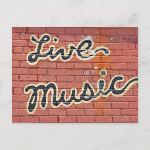 Live music written on a wall postcard