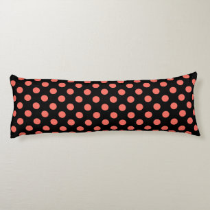 Living coral polka dots on black body cushion
