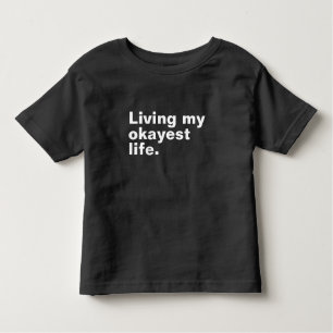 Living my okayest life. funny basic text design toddler T-Shirt