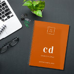 Logo burnt orange monogram initials business 2025 planner<br><div class="desc">Burnt orange background and white text. Personalise and add your logo,  monogram initials,  name and a title year 2025 (or any year). Your logo both on the front and the back.  Space for your website address on the  back.</div>