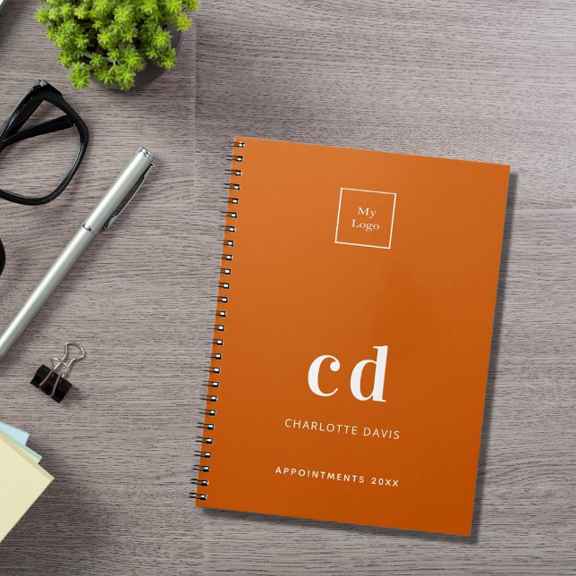 Logo burnt orange monogram initials business notebook (Creator Uploaded)