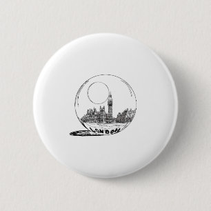 London in a glass ball . 6 cm round badge