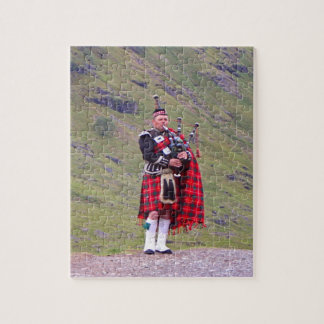 Lone Scottish bagpiper, Highlands, Scotland Jigsaw Puzzle