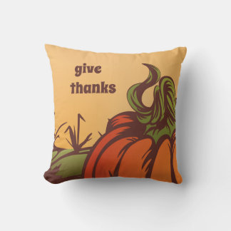 Lonely pumpkin one the field. Autumn leaves fall. Cushion