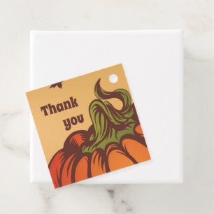 Lonely pumpkin one the field. Autumn leaves fall. Favour Tags