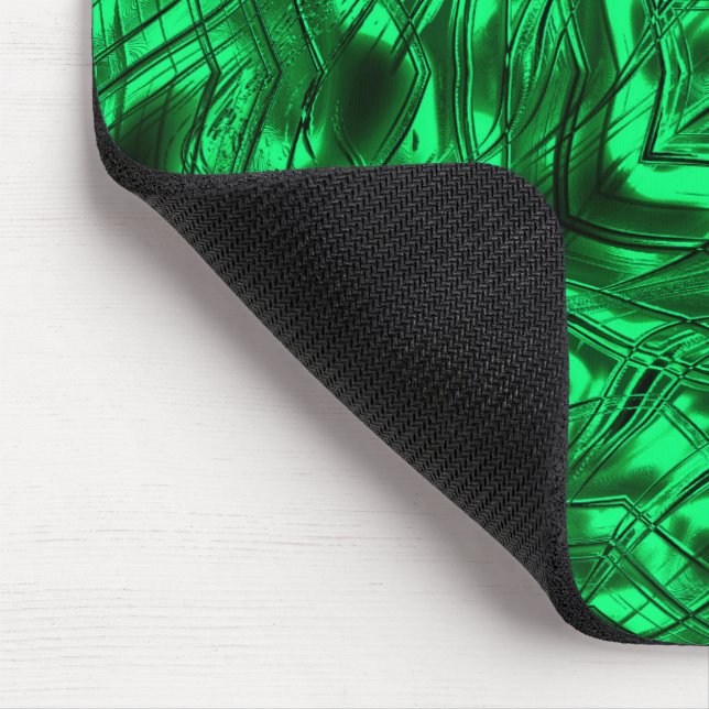 Long curved strokes forming star on green metallic mouse pad (Corner)