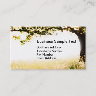 Long grass and tree in morning light business card