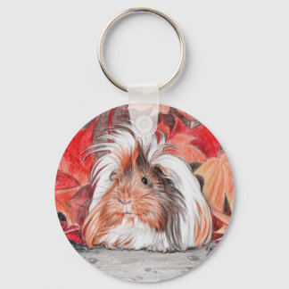 Long haired guinea pig in autumn key ring