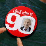 Look who is 90 photo red and white button/badge 7.5 cm round badge<br><div class="desc">Celebrate a 90th Birthday with this fun look who is 90 photo bright red badge/button. Personalise this age badge with a photograph of the birthday boy or girl. Great idea for adding some fun to a birthday party. Can be used to show baby photos or other fun or embarrassing photos...</div>