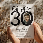 Look who's 30 | Photo 30th Birthday Invitation<br><div class="desc">Celebrate the big 3-0 in style with our customisable and chic 30th birthday invitation! This cleanly designed invitation plays with bold, black typography and a classic white background to emphasize the milestone you've reached. Incorporate your favourite photo into the design, tucked within the zero of '30', setting a personal and...</div>