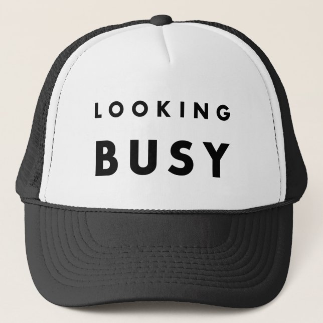 LOOKING BUSY: The Art of Appearances Trucker Hat (Front)
