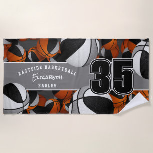 Lots of basketballs with black grey team colours beach towel
