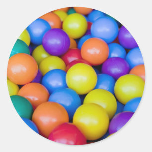 Lots of colourful plastic balls classic round sticker