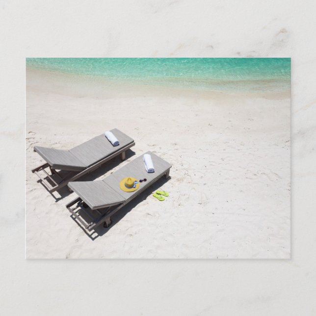 Lounge chairs on a beach postcard (Front)