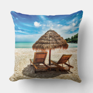 Lounge chairs on beach cushion