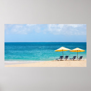 Lounge chairs on the ocean beach poster