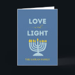 "Love and Light" Menorah Personalised Hanukkah Card<br><div class="desc">Send warm wishes for the Festival of Lights with this elegant "Love and Light" Hanukkah card. Featuring a glowing menorah design, a serene blue background, and customisable family text, this folded card is perfect for sharing heartfelt messages with loved ones. Whether you're celebrating all eight nights or sending blessings from...</div>