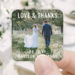 Love and Thanks Modern Photo Wedding Thank You Square Sticker<br><div class="desc">Add a personalized finishing touch to your wedding thank you notes or reception party favors with these square custom photo stickers. Photo and text are simple to customize, so they can easily be used for wedding & bridal shower invitations, save the date cards, and engagement announcements. (IMAGE PLACEMENT TIP: An...</div>