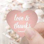 Love and Thanks Pink Rose Gold Faux Foil Thank You Heart Sticker<br><div class="desc">Add an elegant personalised finishing touch to thank you notes, party favours, and decorations with chic calligraphy heart shaped stickers / envelope seals. Design features pretty pink rose gold faux metallic foil, stylish script typography love and thanks, and a name. All text on these versatile labels is simple to customise,...</div>