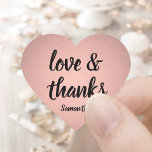 Love and Thanks Pink Rose Gold Faux Foil Thank You Heart Sticker<br><div class="desc">Add an elegant personalised finishing touch to thank you notes, party favours, and decorations with these chic calligraphy heart shaped stickers / envelope seals. Design features pretty pink rose gold faux metallic foil, stylish script love and thanks, and a name. All text on these versatile labels is simple to customise,...</div>