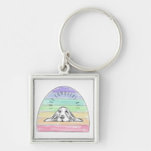 love conquers all dog rainbow basset hound  key ring