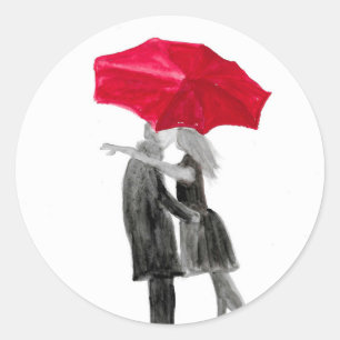 Love couple with red umbrella classic round sticker
