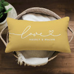 Love in Heart Script Golden Yellow Custom Monogram Lumbar Cushion<br><div class="desc">Modern and stylish custom lumbar throw pillow design features a simple and minimal "Love" typography design that includes flourish and heart details. Personalise the uppercase text below with a monogram for a couple or family,  a quote,  or other preferred text. The golden yellow and white colours can be modified.</div>