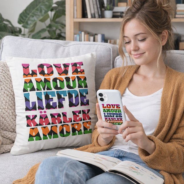 Love in Multilanguages Neon Hearts Cushion (A throw pillow that says love in multiple languages with a heart pattern.)